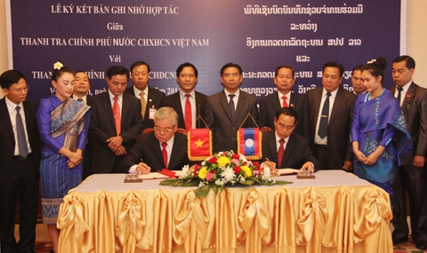 越南和老挝政府监察部门签署合作备忘录