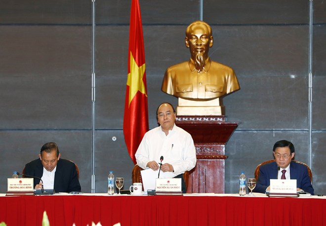 政府总理阮春福主持召开会议 商讨措施帮助企业化解困难