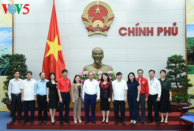 良好发挥越南红十字会在保障国家社会民生工作中的作用