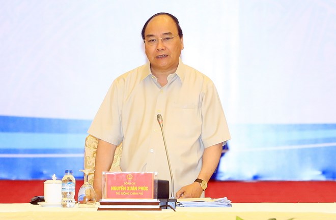 政府总理阮春福与国内一流私人经济集团领导进行政策对话