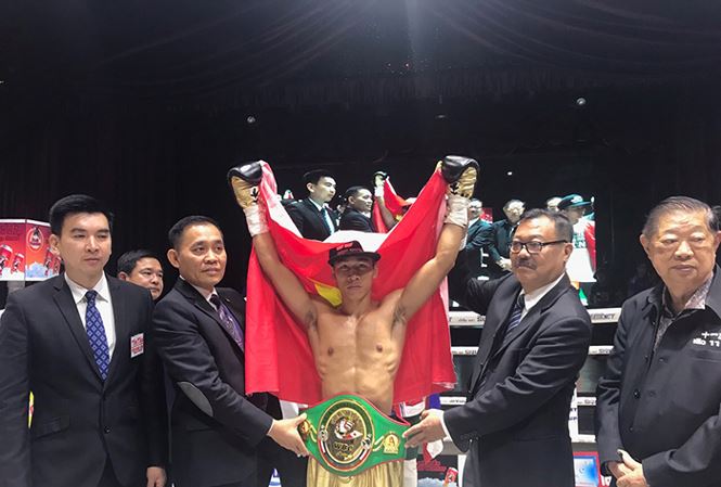 WBC亚洲职业拳击赛：越南武士陈文草夺冠