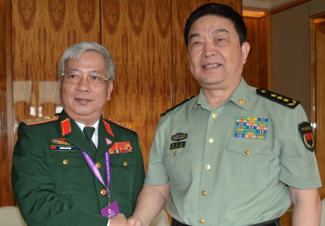 国防部副部长阮志咏同新加坡、中国防长进行会晤