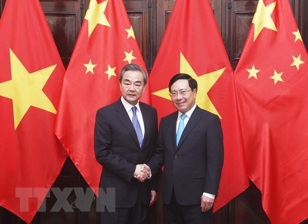 越南政府副总理兼外交部长范平明同中国外交部长王毅举行会谈