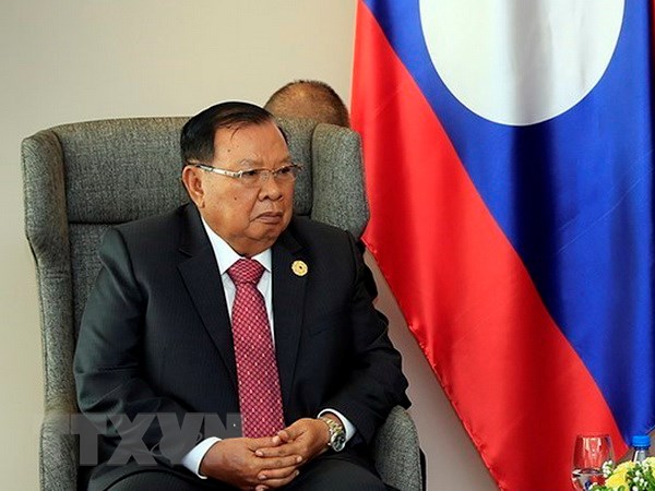 老挝人民革命党中央总书记、国家主席会见越南共产党高级代表团