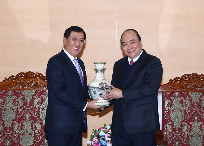 阮春福总理建议央行继续协助老挝