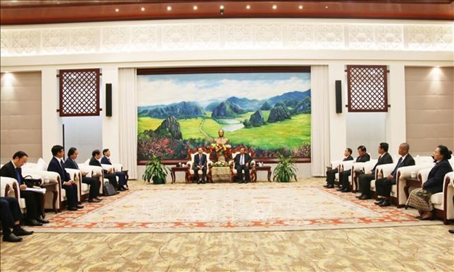 越共中央办公厅代表团对老挝进行工作访问