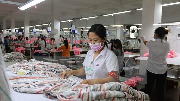 胡志明市协助企业加大生产力度