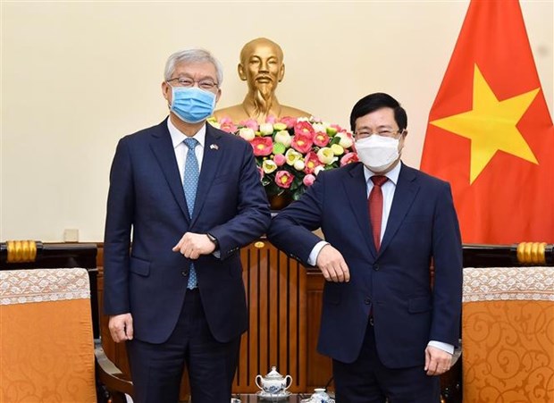 越南政府副总理兼外长范平明会见韩国外交部副部长李泰镐