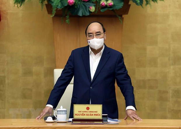 阮春福总理主持召开政府常委会与新冠肺炎防控国家指导委员会的会议