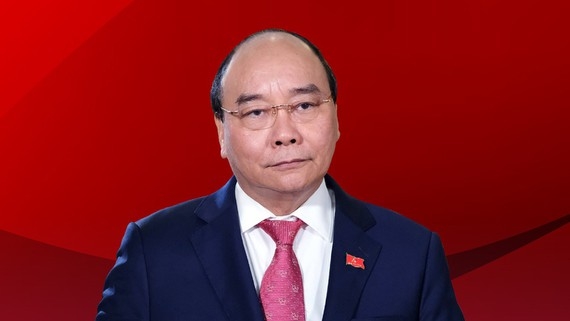 国家主席阮春福在胡志明市古芝和霍门县选举单位竞选越南国会代表