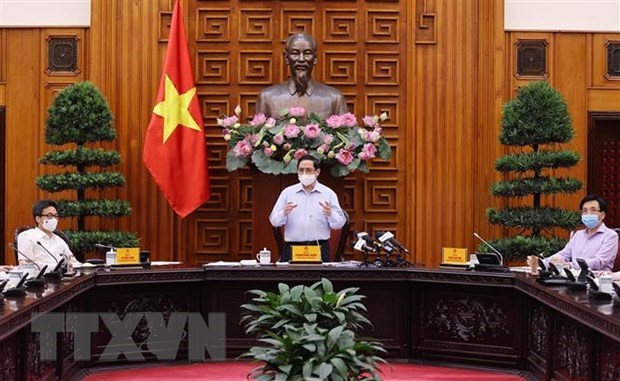 越南政府总理范明正与卫生部领导举行工作座谈会