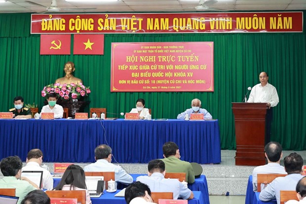 ​国家主席阮春福会见胡志明市古芝和霍门县选民