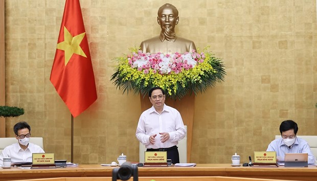越南政府总理范明正主持政府6月例行会议