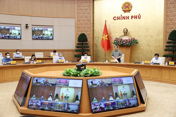 越南政府总理范明正：疫情防控不可掉以轻心 急于开放经营活动