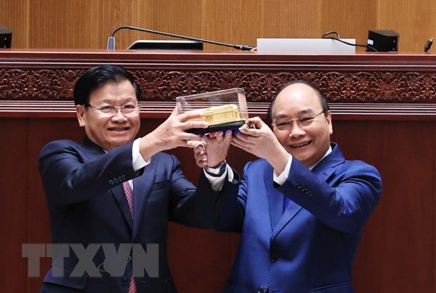 越南党和国家领导人致电祝贺老挝国庆46周年