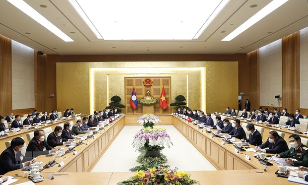 越南政府总理范明正与老挝政府总理潘坎·维帕万举行会谈