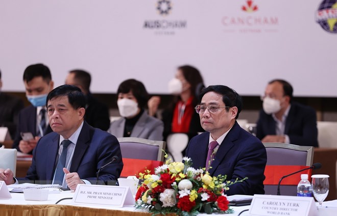 政府总理范明正出席越南企业论坛