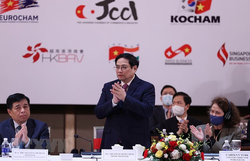 范明正总理：政府和企业同甘共苦、风险共担 有效落实2022年发展目标