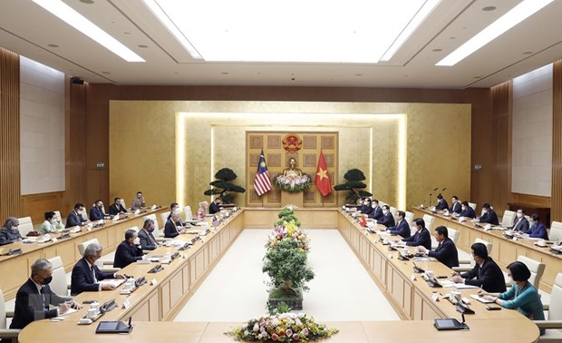 政府总理范明正与马来西亚总理伊斯梅尔·萨布里·雅各布举行会谈