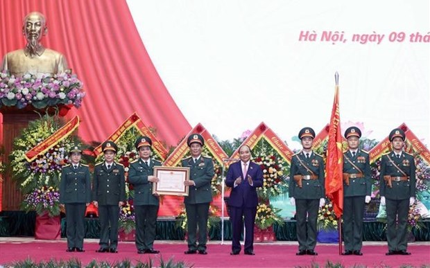 阮春福主席出席越南国防部11兵团传统日40周年纪念典礼