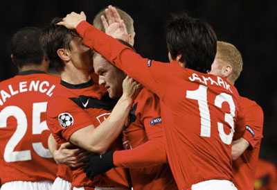 冠军杯综合信息：曼联4-0米兰进8强，皇马1-1里昂出局