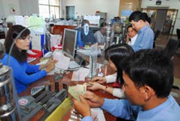 Thị trường liên ngân hàng Giao dịch bằng VND và USD đều giảm