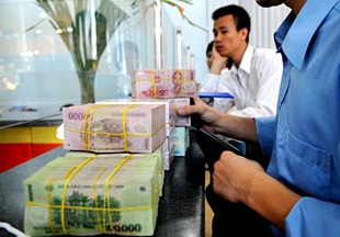 Central bank pledges lower rates for businesses