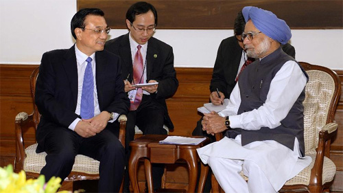 Behind the handshake of two Asian giants