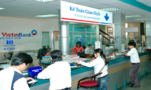 Bank pre-tax profits rise in first half