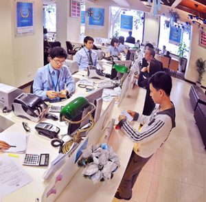 Năm 2014 Thực hiện chính sách tiền tệ và bảo đảm hoạt động ngân hàng an toàn, hiệu quả
