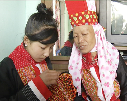 Person preserves Dao ethnic traditional clothing