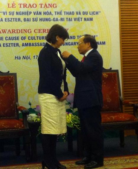 Presenting insignia to Hungarian Ambassador to Vietnam