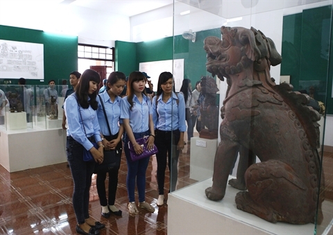Exposition sur l image du lion dans les sculptures antiques du Vietnam