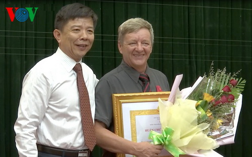 Presenting third-class labour medal to men who discovered Son Doong cave