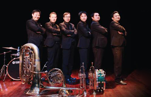 Enjoying brass instrument concert in Hanoi