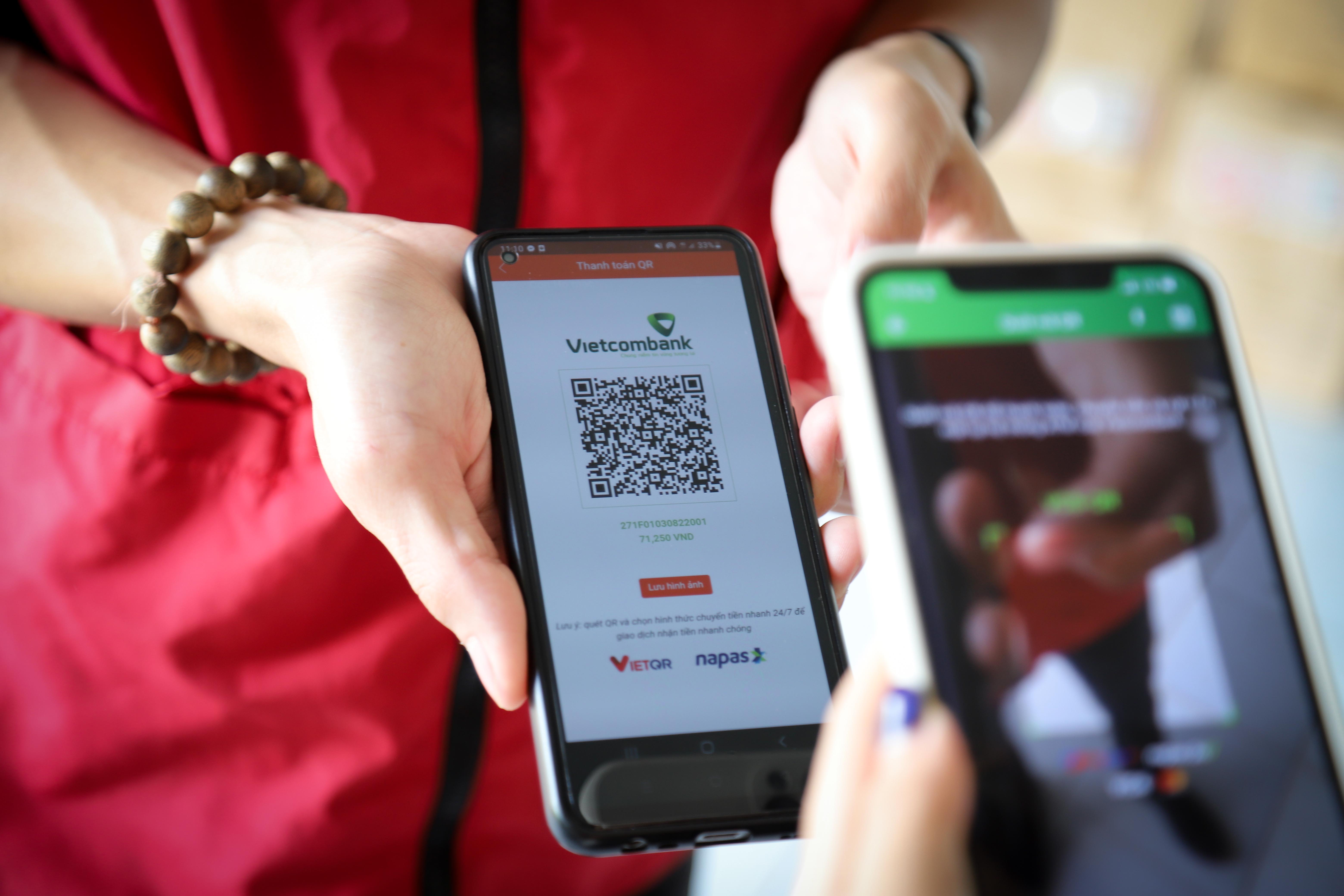 Vietcombank và J T Express phối hợp triển khai thanh toán đơn hàng bằng mã QR động