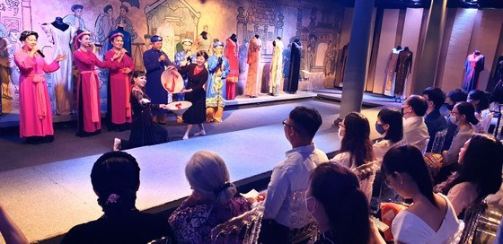 Intangible cultural heritage performance underway at Ao Dai exhibtion in Ho Chi Minh City