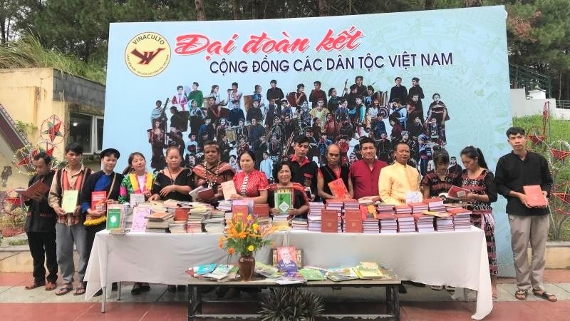 Presenting over 600 books to representatives of 14 ethnic groups at the National Village