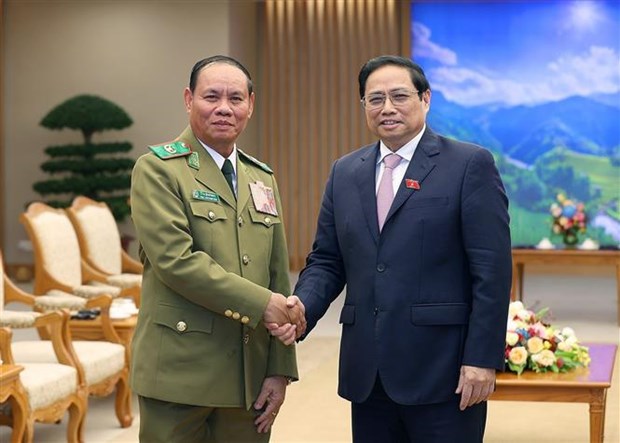 PM receives Lao Deputy PM and Minister of Public Security