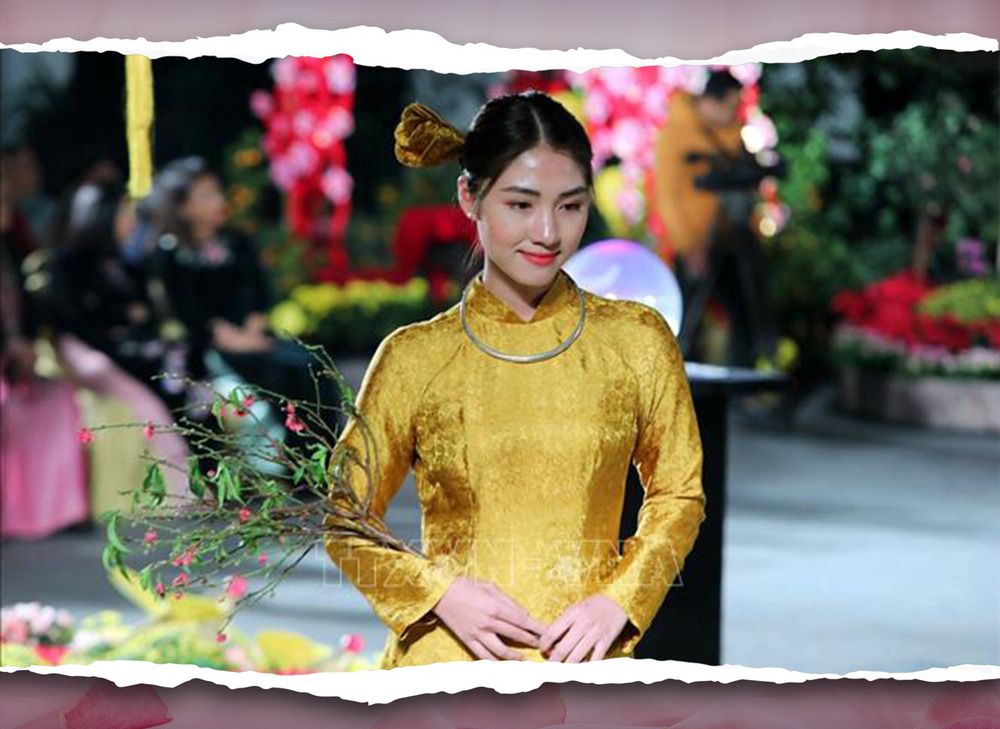 Introducing Ao Dai to Japanese friends in Ho Chi Minh City