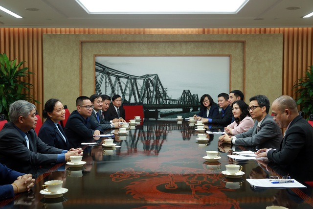 Vietnam, Laos develop strategic direction on labor-society cooperation
