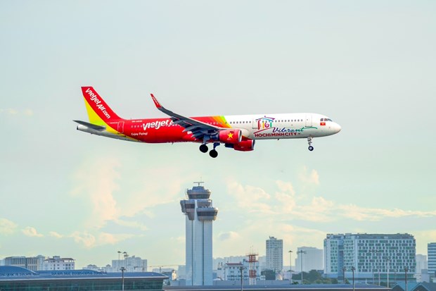 Vietjet aircraft bearing Ho Chi Minh City tourism symbol lands at Tan Son Nhat airport