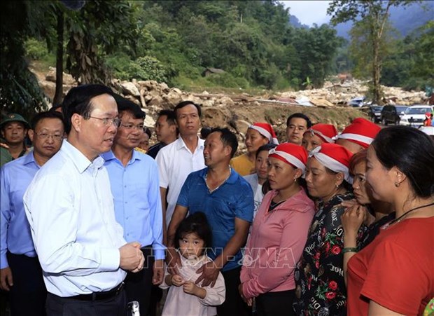 President visits families affected by flash flood in Lao Cai province