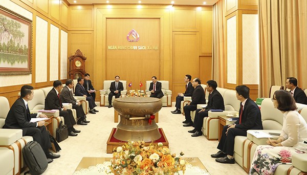 Vietnam, Laos share experiences in building social policies