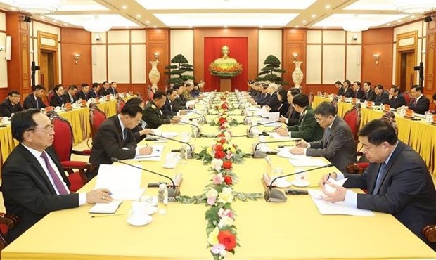 Top leaders of Vietnamese, Lao Parties meet in Hanoi