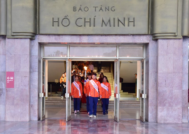 Torch lighting ceremony at the Ho Chi Minh Museum