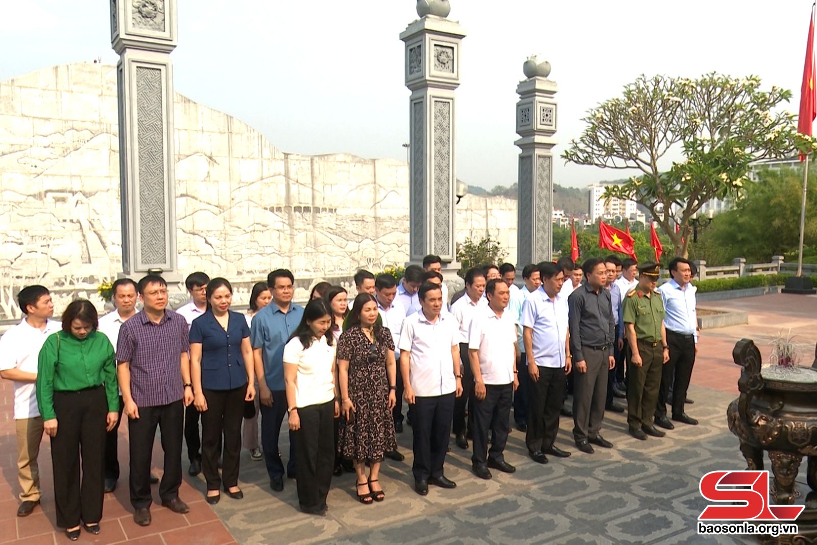 Offering incense to commemorate President Ho Chi Minh at his temple in Son La