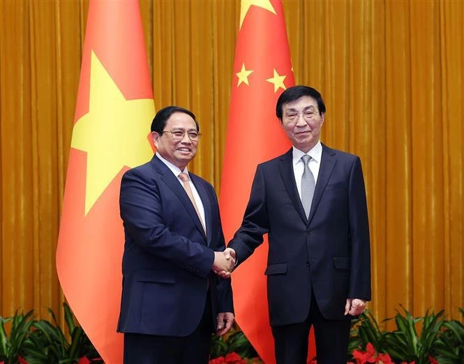 PM meets with Chinese front leader in Beijing
