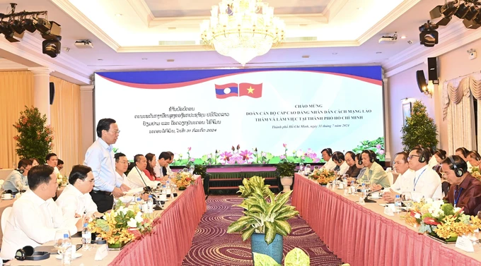 Ho Chi Minh strengthens cooperation with Lao localities