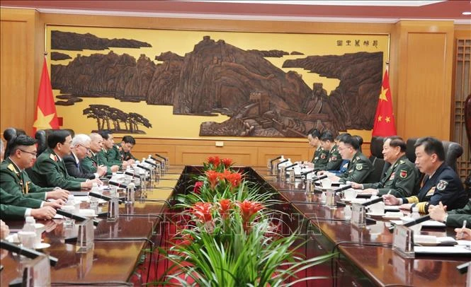 Minister meets foreign defence leaders in Beijing